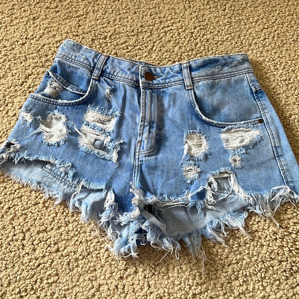 Blue jeans with ripped details